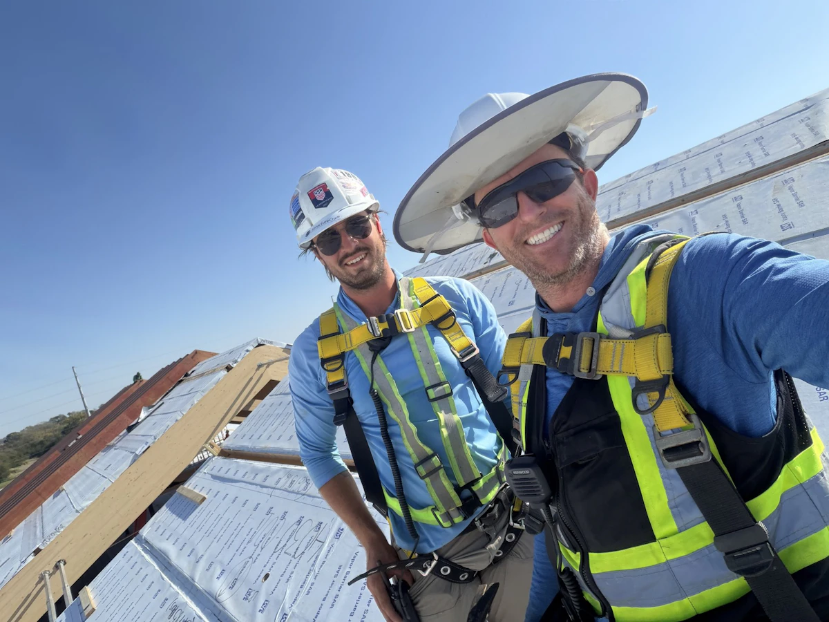 Two StructureCraft crew members working at height at Homemakers
