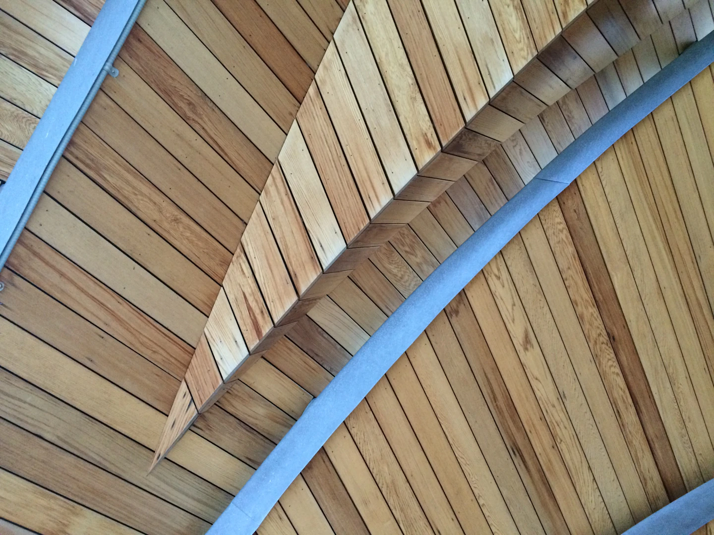 Exposed timber decking and steel framing working together in a structure