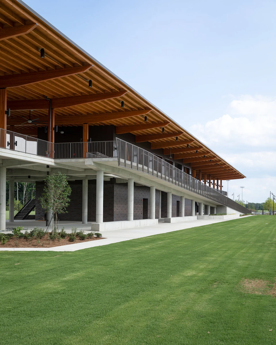 Field-side daytime elevation of the long timber canopy at the U.S. Soccer National Training Center.