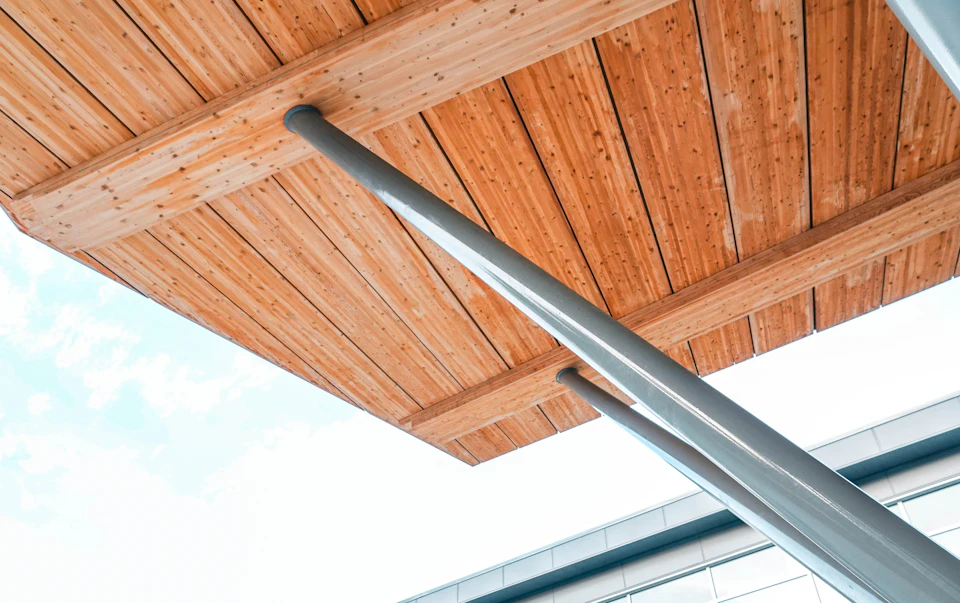 Timber canopy and steel support at Abbotsford Christian School Entrance