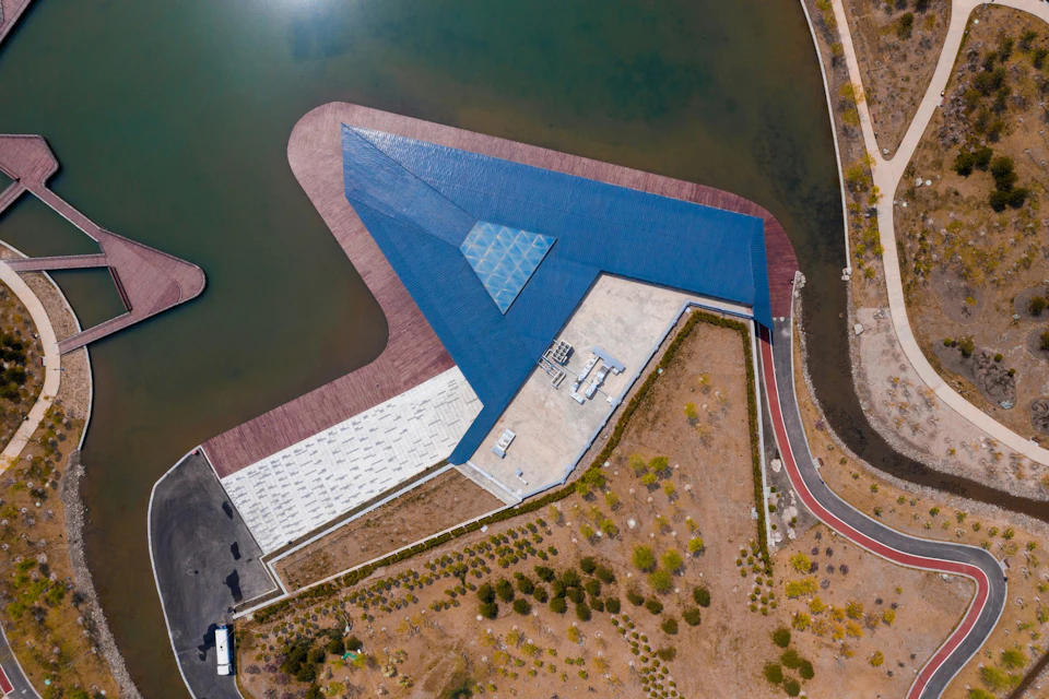 Aerial view of the triangular Tea House extending into the lake