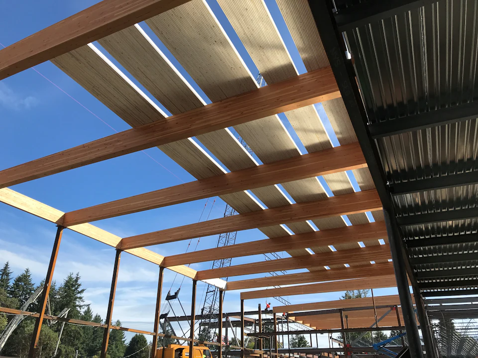 Timber roof framing under construction at Kellogg Middle School
