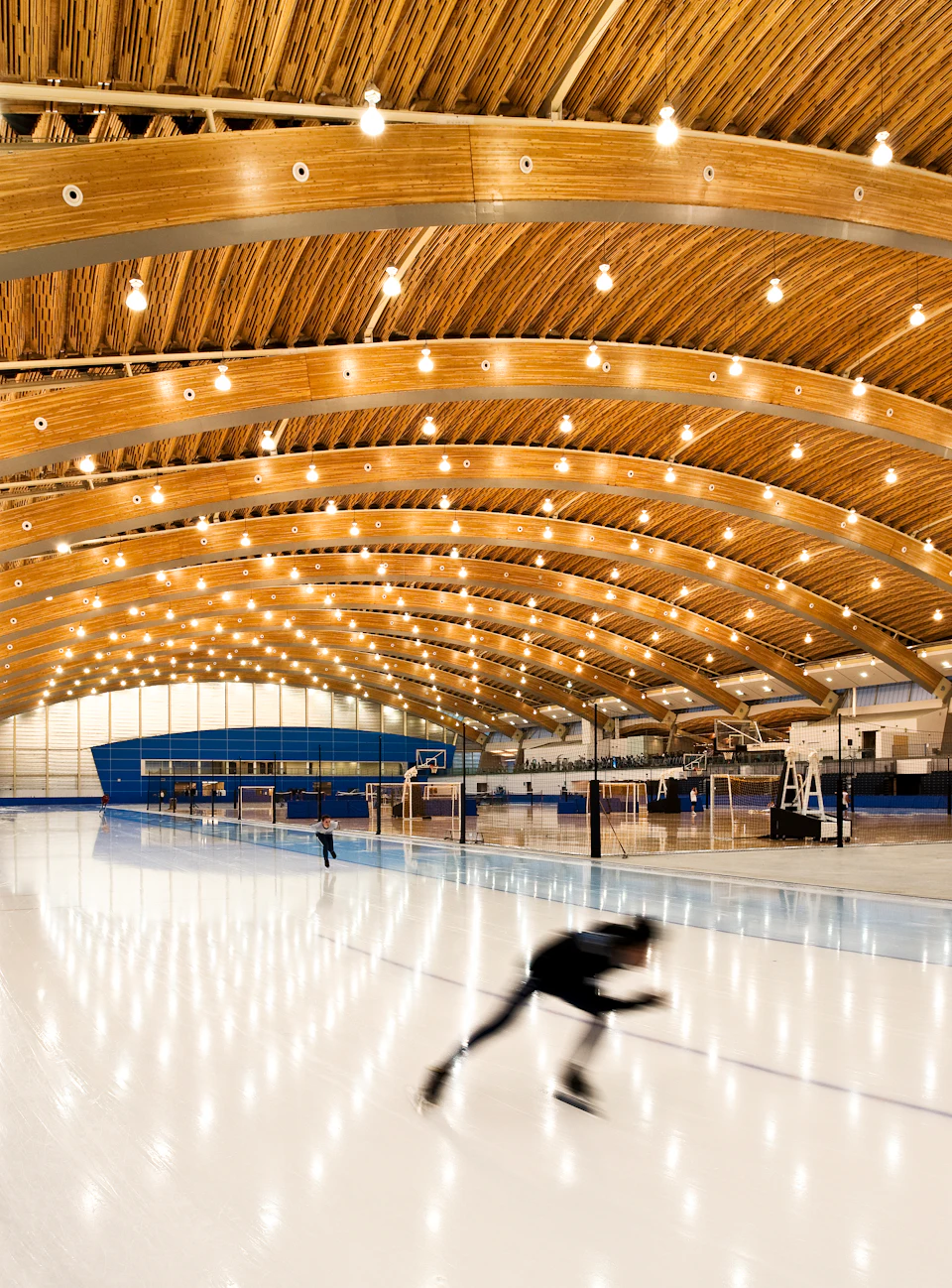 Skater beneath the wood roof at Richmond Olympic Oval
