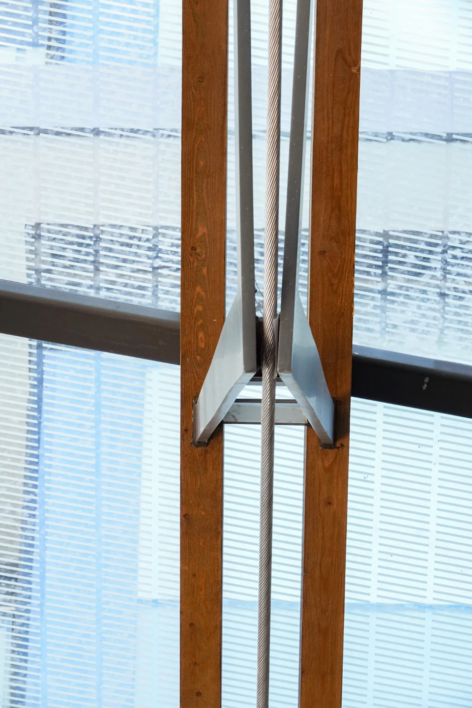 Suspended wood-fin detail at the Ambleside Galleria canopy