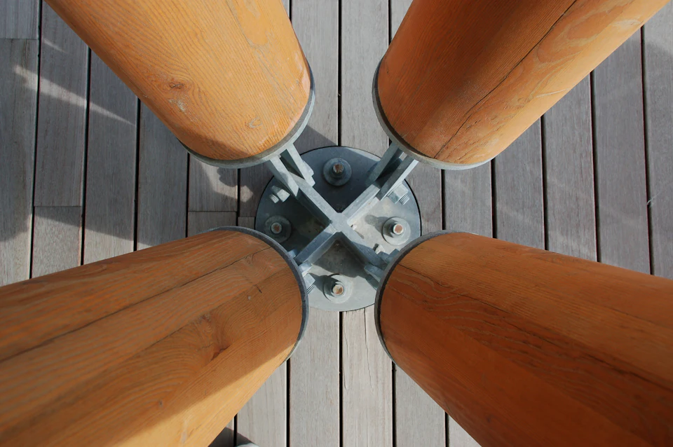 Timber column base connection at Calgary East Village Presentation Centre