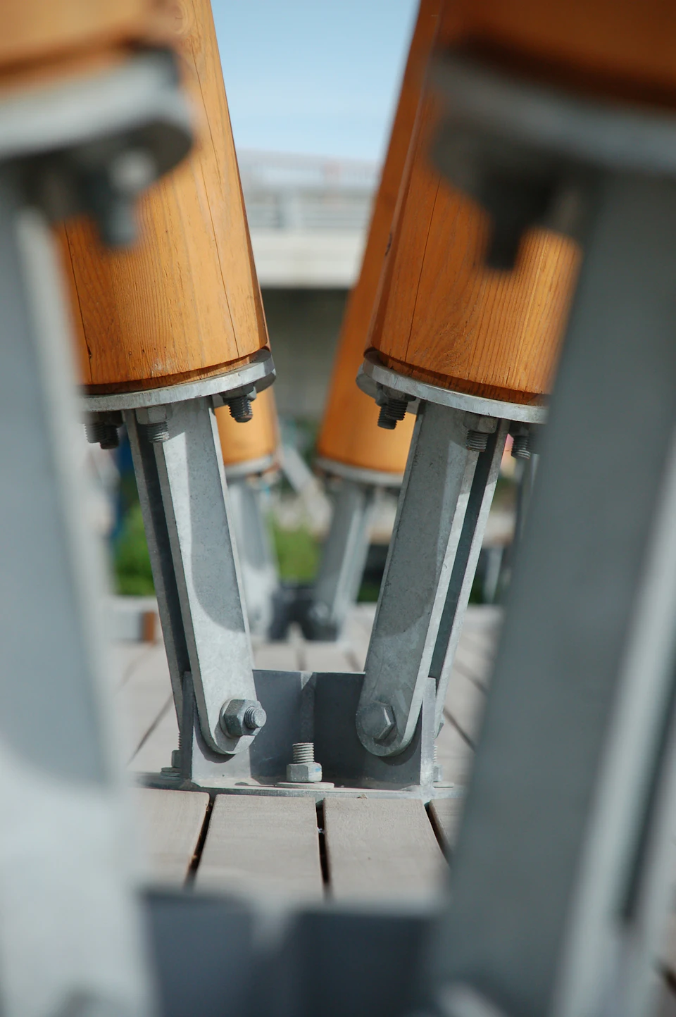 Steel connector between angled wood columns at Calgary East Village