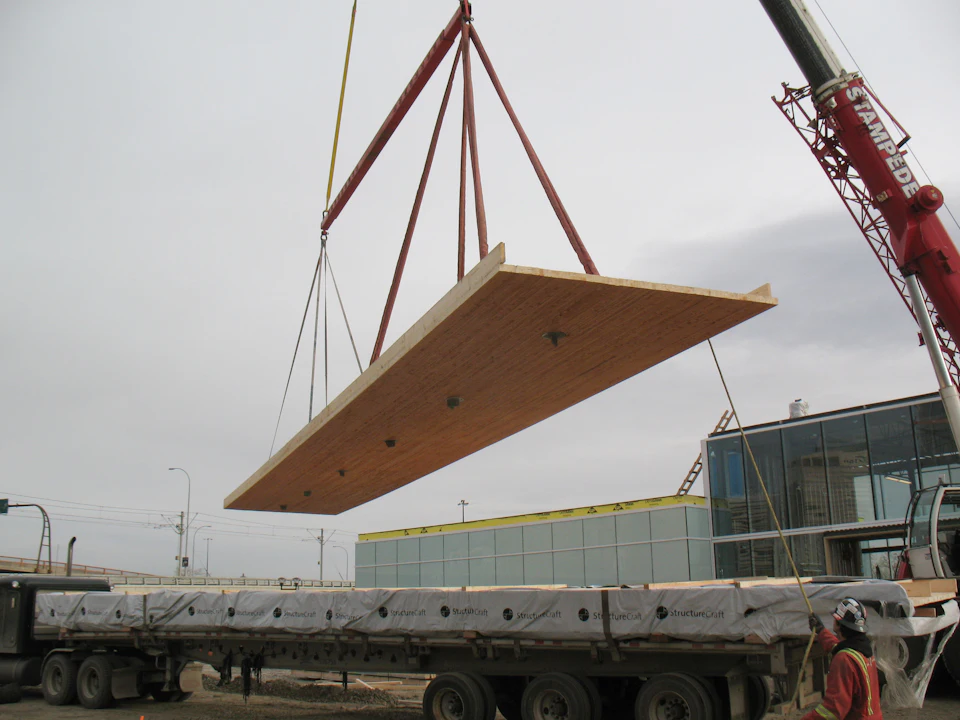 Roof panel being lifted at Calgary East Village Presentation Centre