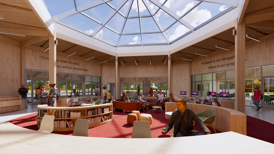 Community center atrium beneath a circular skylight