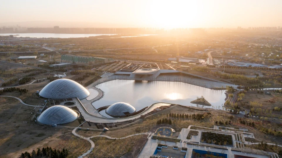 Aerial view of Taiyuan Botanical Garden domes at sunset