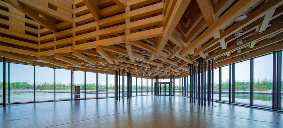 Open interior beneath the latticed roof at Taiyuan Botanical Garden Tea House