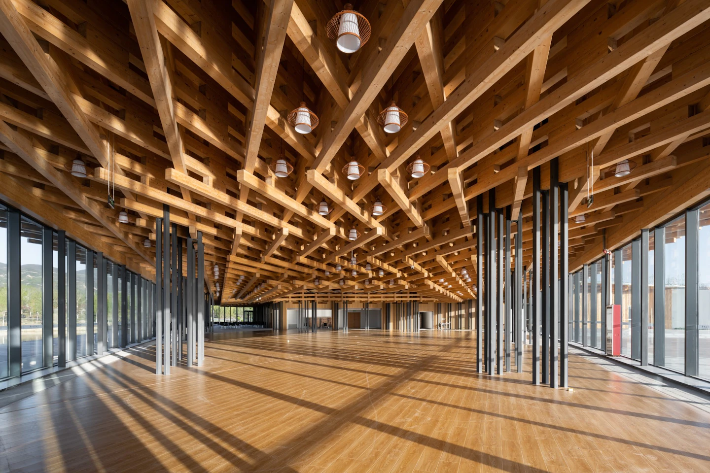 Sunlit interior beneath the latticed roof at Taiyuan Botanical Garden Tea House