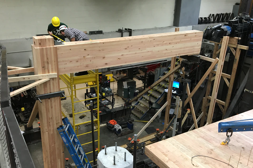 Timber assembly undergoing structural testing for Framework