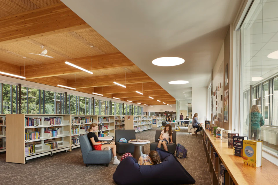 Library beneath a timber ceiling at Kellogg Middle School