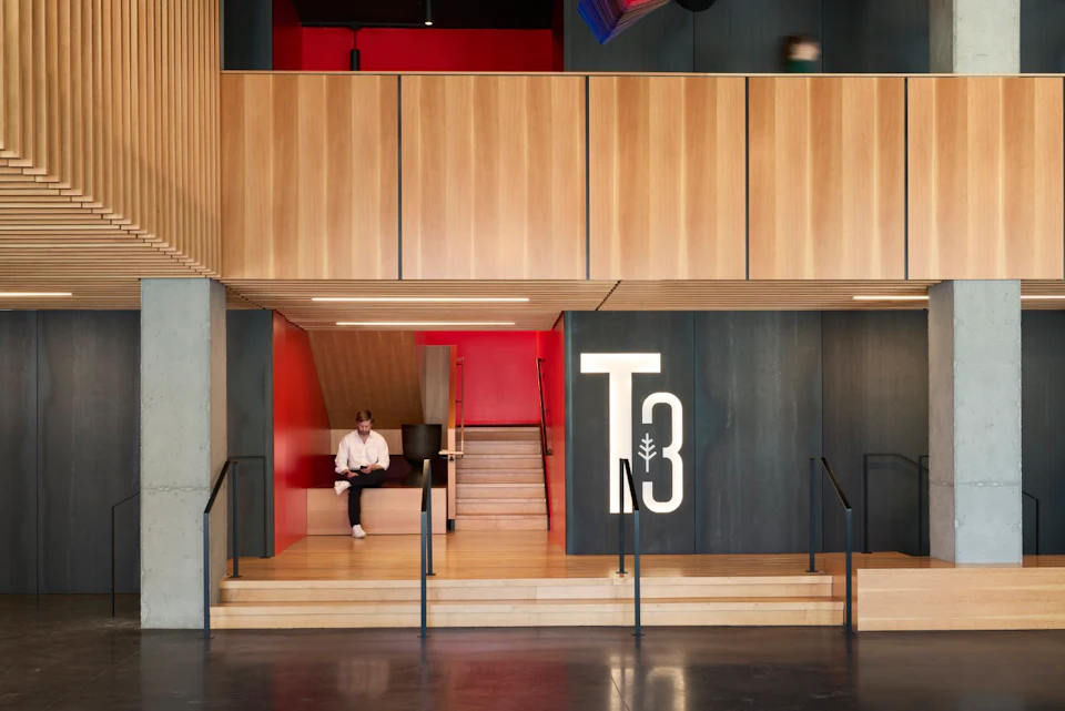 Wood-clad lobby entrance at T3 Wedgewood-Houston