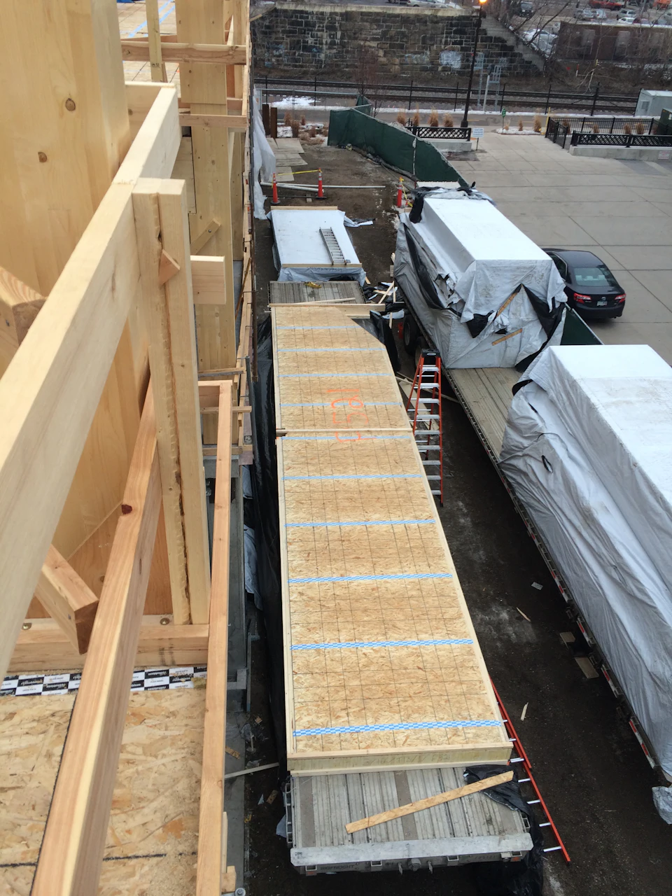 Wood floor panels staged beside T3 Minneapolis
