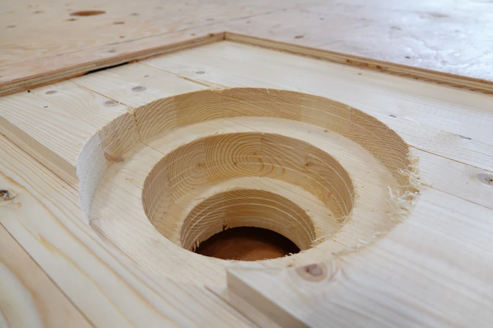 Machined circular opening in a stair component