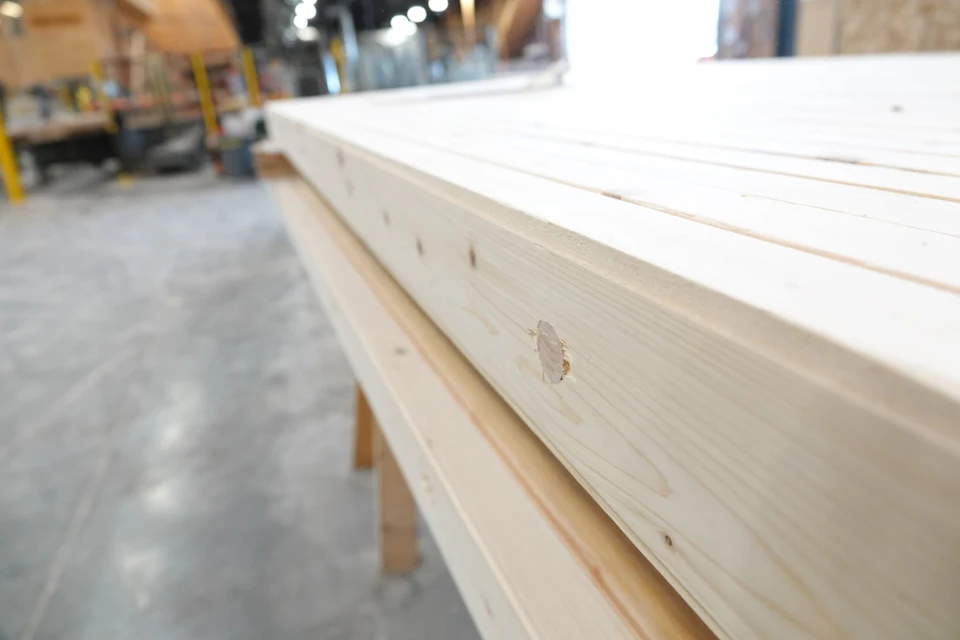 Stacked timber boards for KF Aerospace Centre