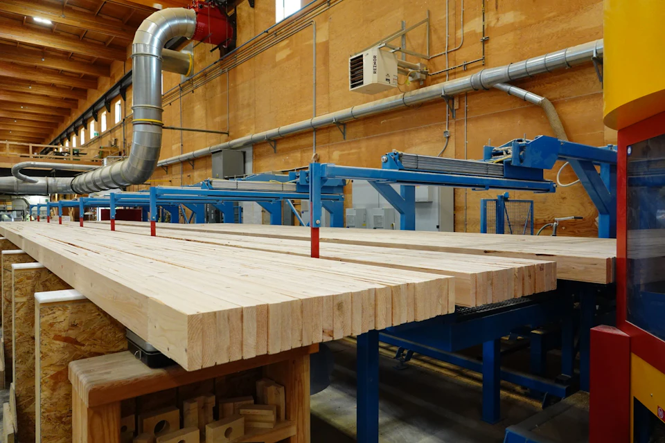 Timber panels on fabrication equipment for KF Aerospace Centre