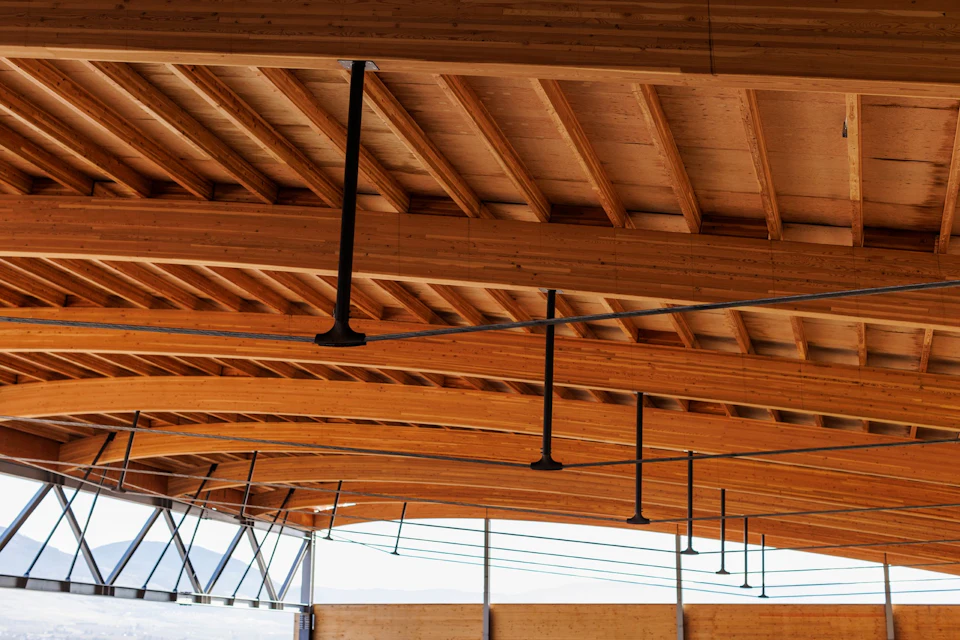 Finished wood roof framing inside KF Aerospace Centre