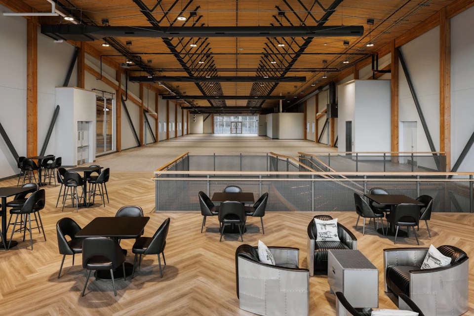 Lounge beneath an exposed timber ceiling at KF Aerospace Centre