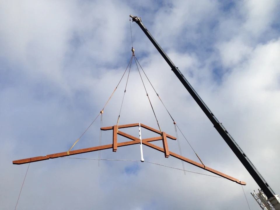 Roof truss suspended from a crane for King's Links Clubhouse