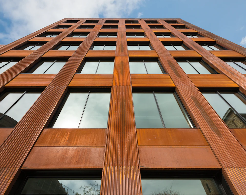 Upward view of the wood-clad facade at T3 Minneapolis