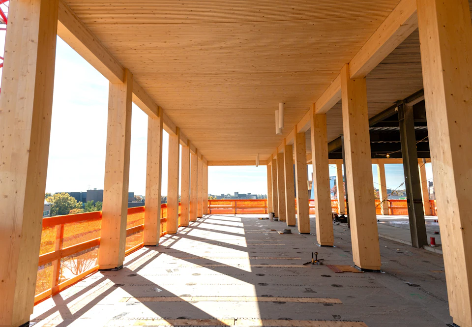 Wood columns and floor panels under construction at Princeton University Commons