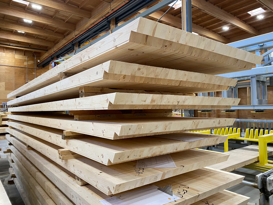 Wood floor panels stacked in the fabrication shop for Nashville Warehouse Company Office