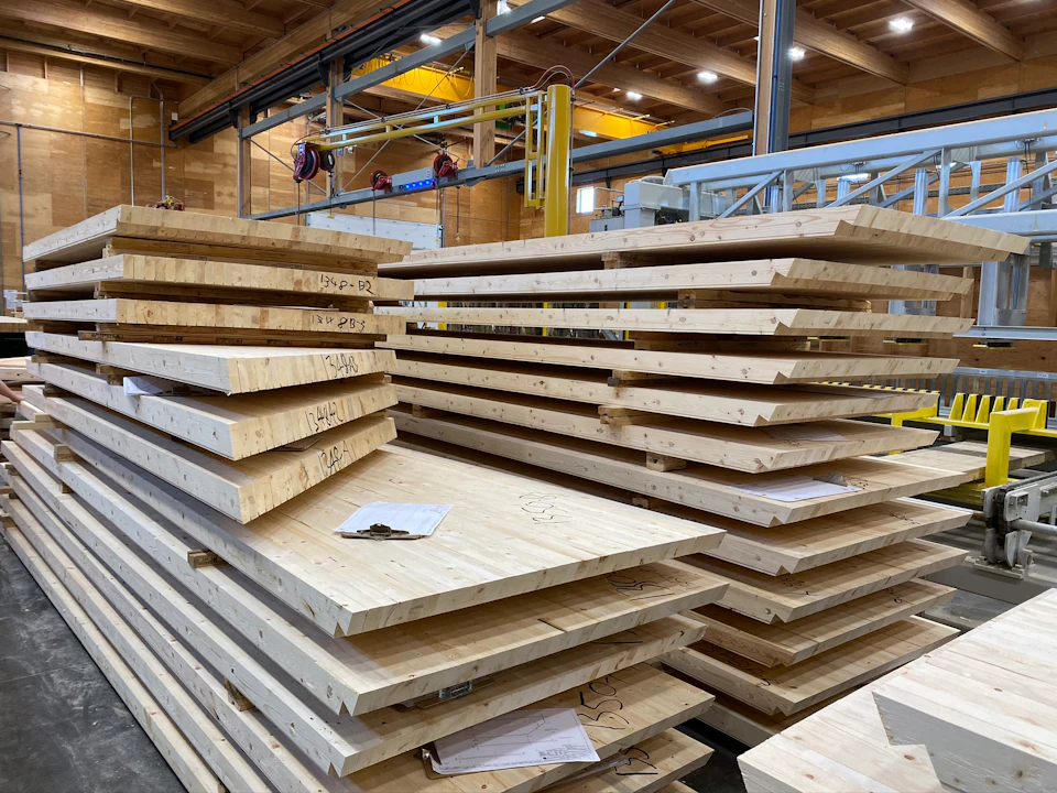 Stacked wood floor panels in the fabrication shop for Nashville Warehouse Company Office
