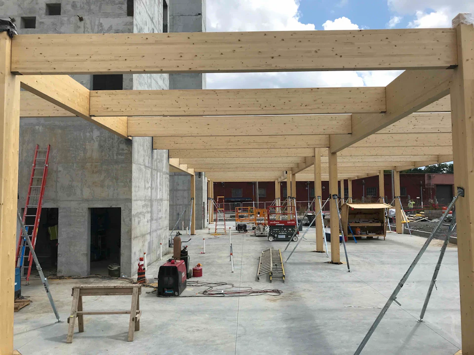 Wood columns and beams under construction at Nashville Warehouse Company Office