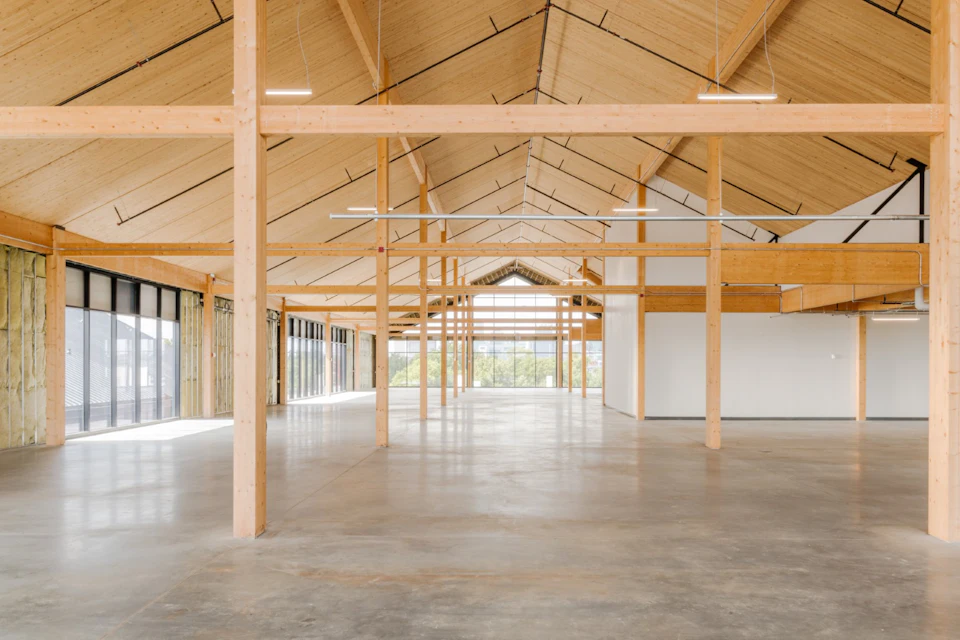 Finished open office framed with wood at Nashville Warehouse Company Office