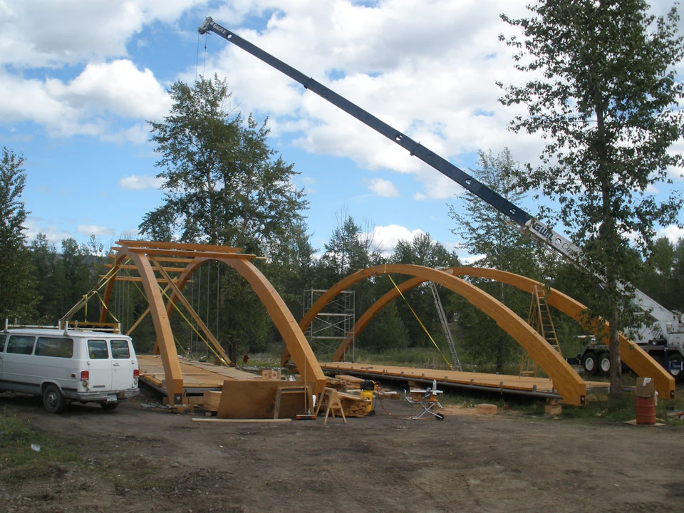 Wood bridge span assembled on the ground at Princeton Bridge of Dreams