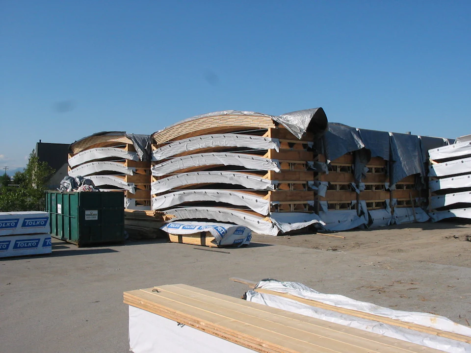 Stacks of curved roof components for Richmond Olympic Oval