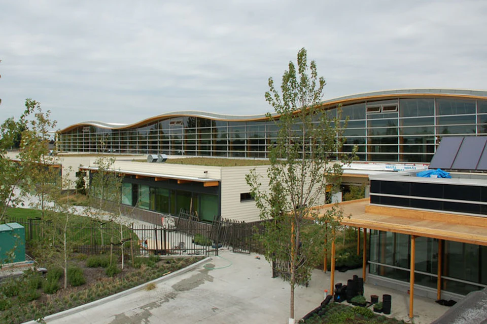 Samuel Brighouse School courtyard beneath the curving atrium roof