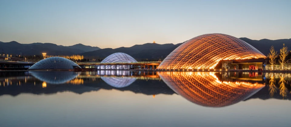 Taiyuan Botanical Garden domes reflected in the water at night