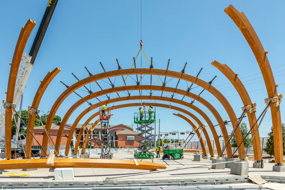 Curved ribs under construction at Halperin Park stage canopy