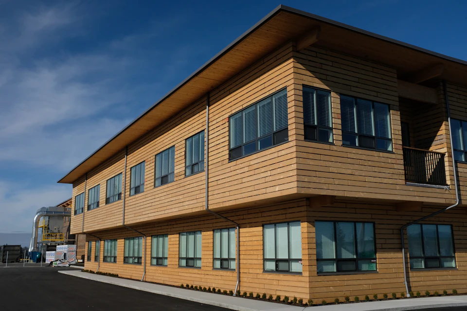 Wood-clad office exterior at StructureCraft Headquarters
