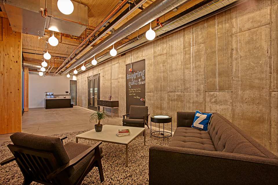Meeting room beneath a wood ceiling at T3 Minneapolis