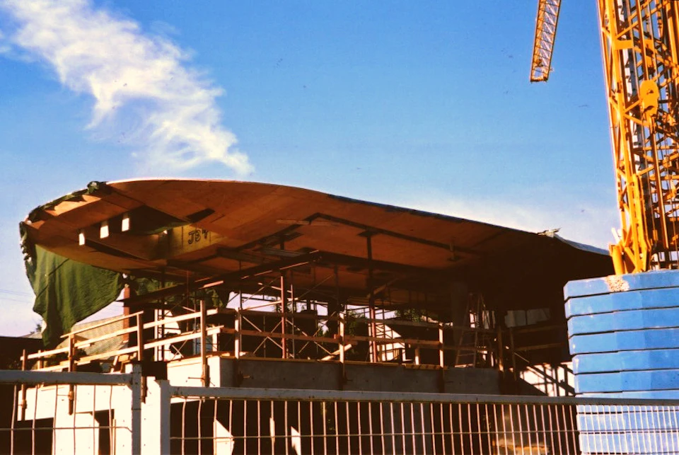 Curved wood roof under construction at Lo Residence