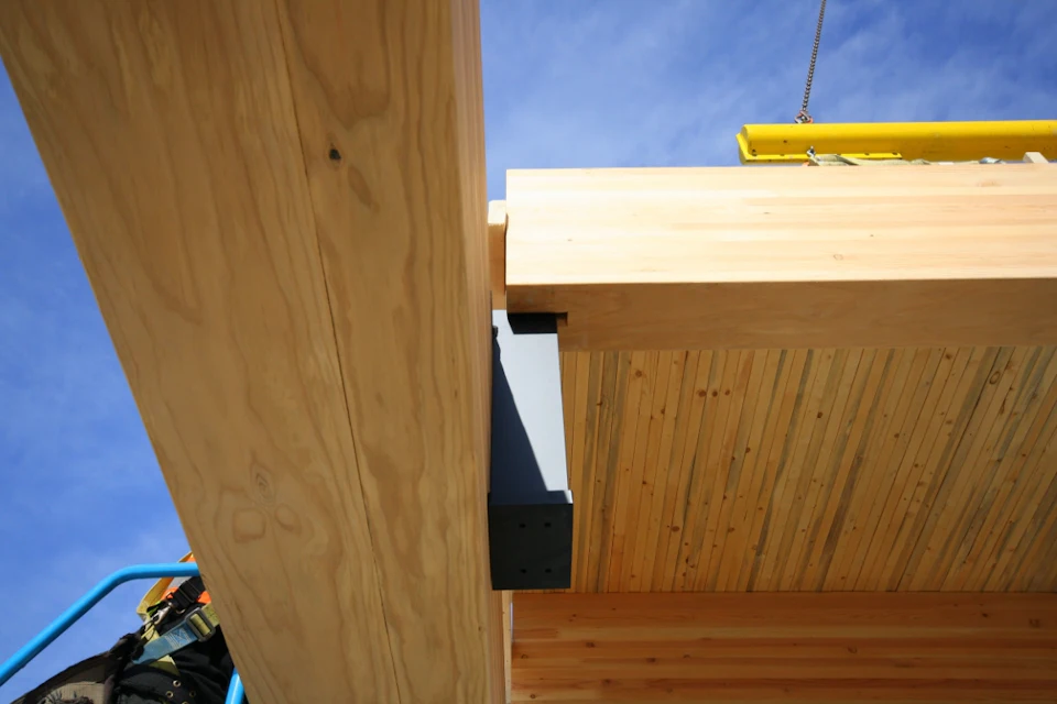 Wood roof panel during installation at Trail Appliances Headquarters